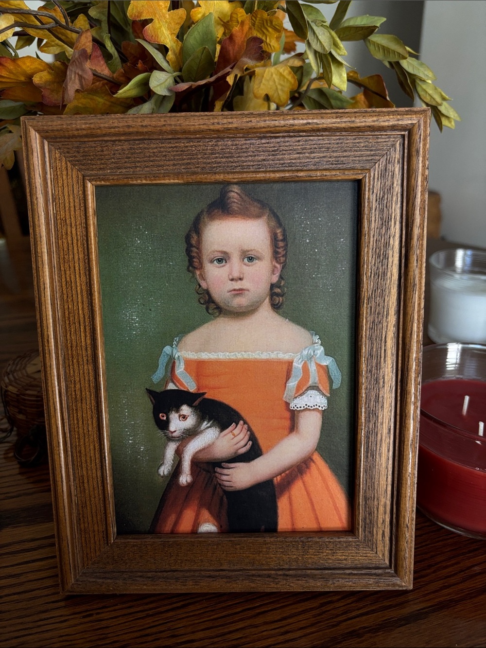 Framed Primitive Style Print of a Girl and Her Cat